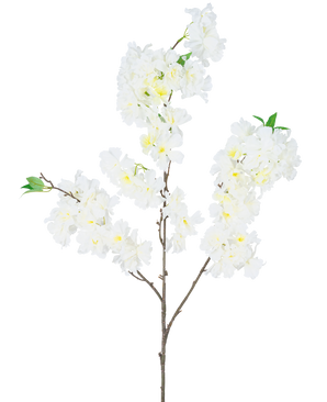 De Kunst Kersenbloesem 106 cm wit heeft een enkele bruine tak met trosjes witte kunstkersenbloesembloemen en kleine groene blaadjes, tegen een effen witte achtergrond.