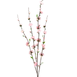 De Kunstbloem Bloesem 93 cm roze heeft drie slanke bruine takken met kleine lichtroze bloesems en groene bladeren, verspreid over de stelen voor een delicate, luchtige uitstraling tegen een witte achtergrond.