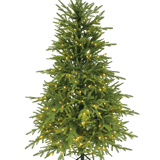 De "Sigrid" kunstkerstboom (100% PE) met slimme LED-lampjes in warm wit staat op een metalen standaard tegen een effen witte achtergrond.