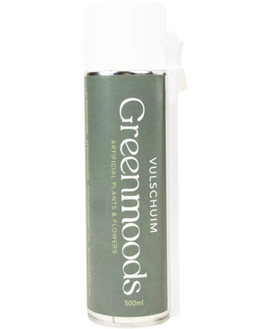 Een bus Vulschuim 500ml - Plantfixatie voor gebruik met kunstplanten en -bloemen. Het blik heeft een groen etiket met witte tekst en een witte dop.